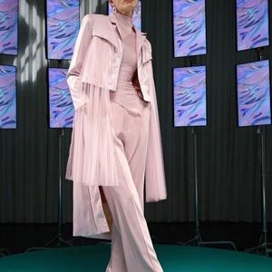 Step into the Matrix with this Pink vinyl trench coat. ✨💕